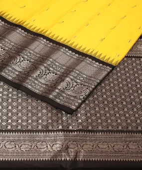 Yellow black handwoven gadwal silk saree